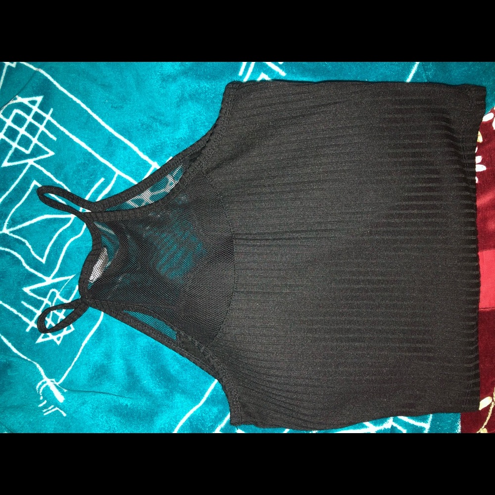 Small crop top, mesh on the top, worn like 3x